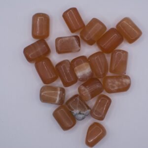 Honungskalcit trumlad sten – gul-orange kristall